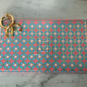 Carolina Herrera pouch/ make up bag with logo charm